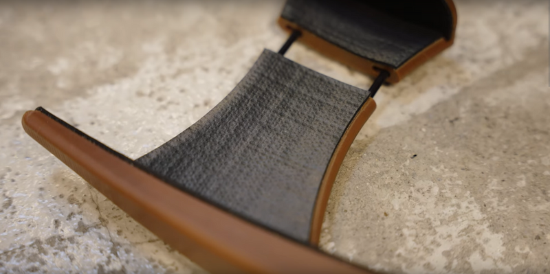 Close-up of the neoprene padding on the guitar clamp’s contact surfaces
